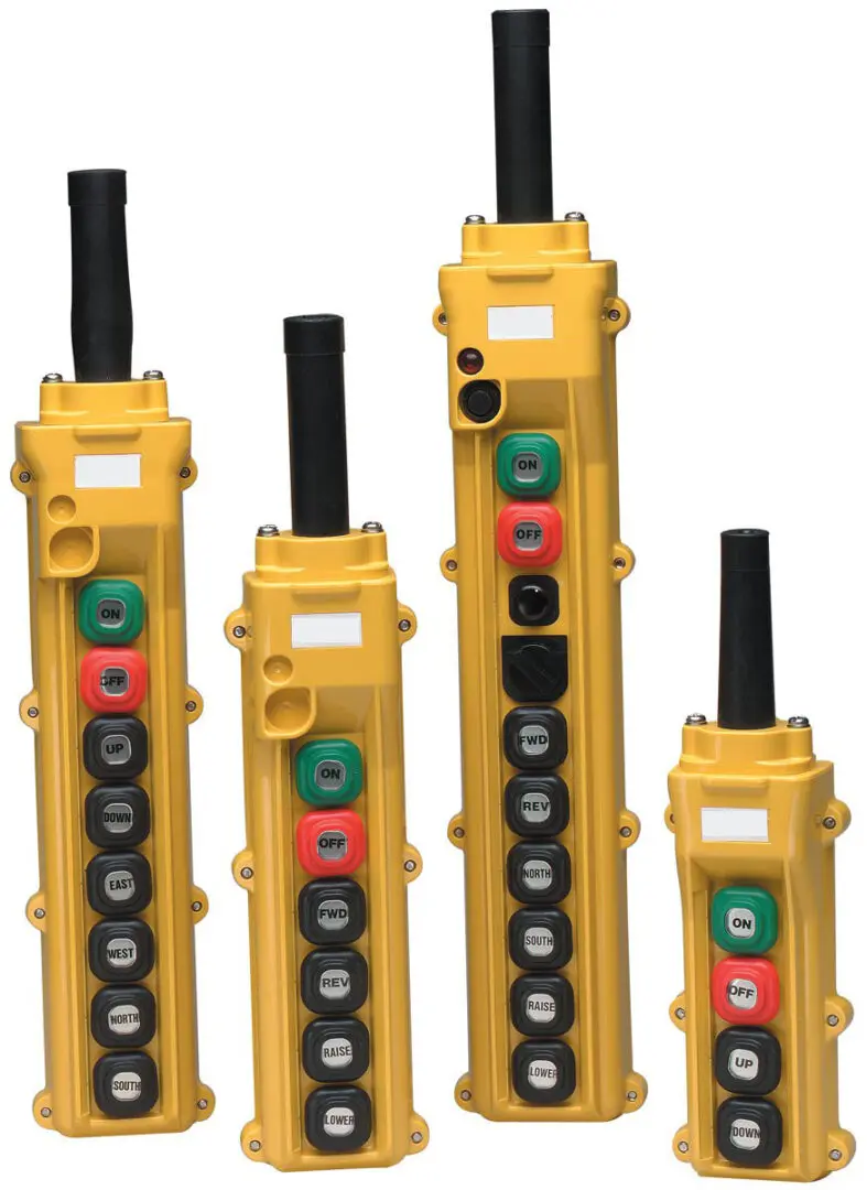 Yellow industrial control panels with buttons.