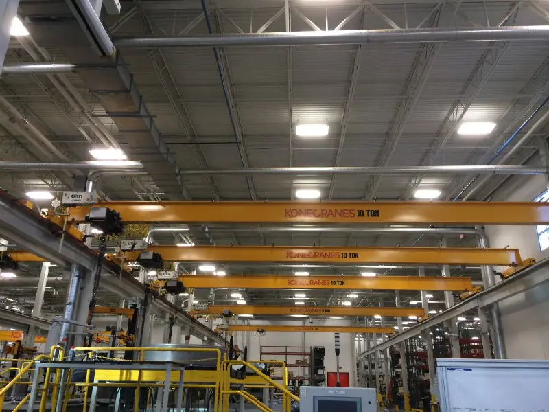 Industrial warehouse with multiple overhead cranes.