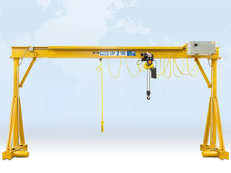 Yellow gantry crane with 2-ton capacity.